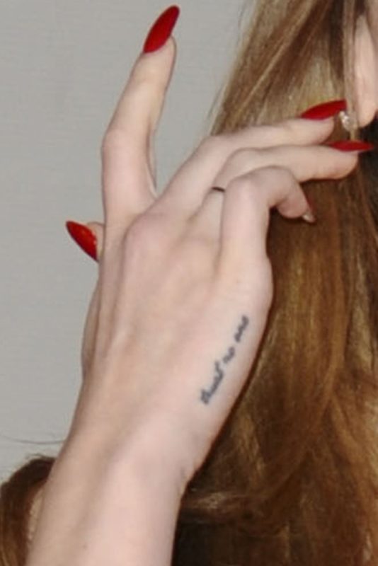 Arabic Word Tattoo On Finger