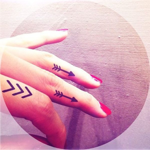 Arrow Tattoo on Finger