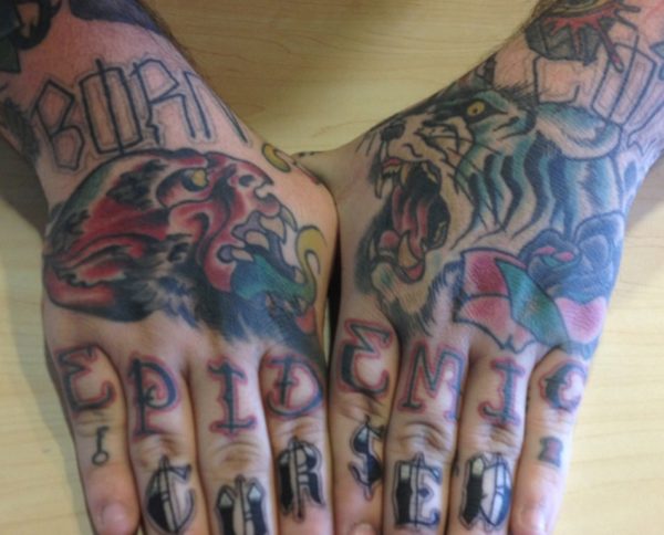 Attractive knuckle Tattoo