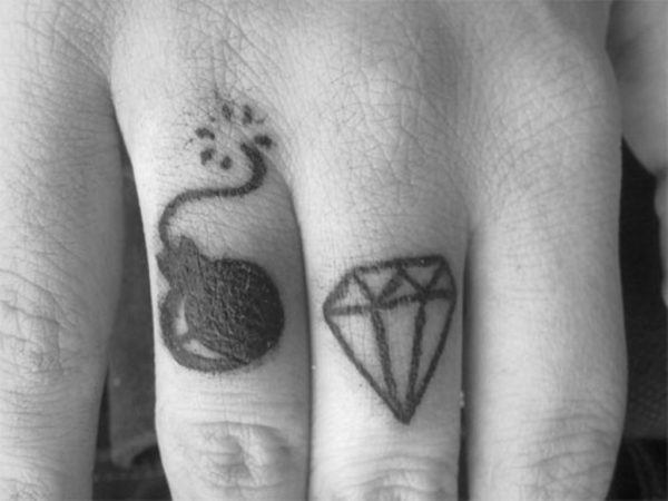 Black Diamond Tattoo On Finger