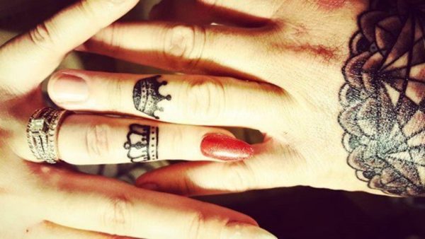 Black King And Queen Crown Tattoo On Couple Finger