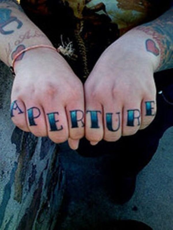 Blue Wording Tattoo