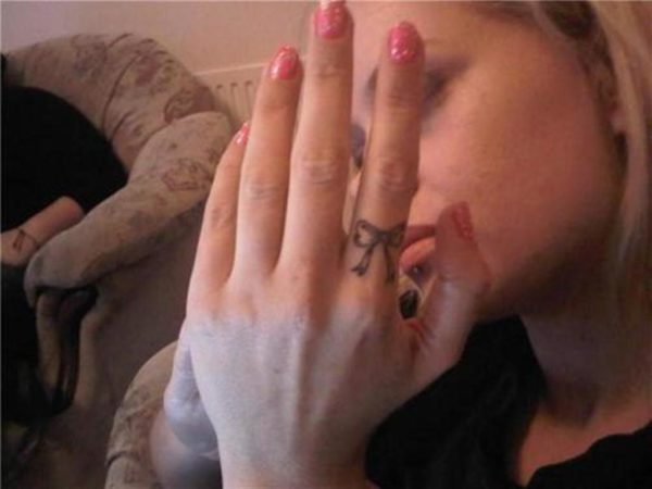Bow Tattoo Design On Finger