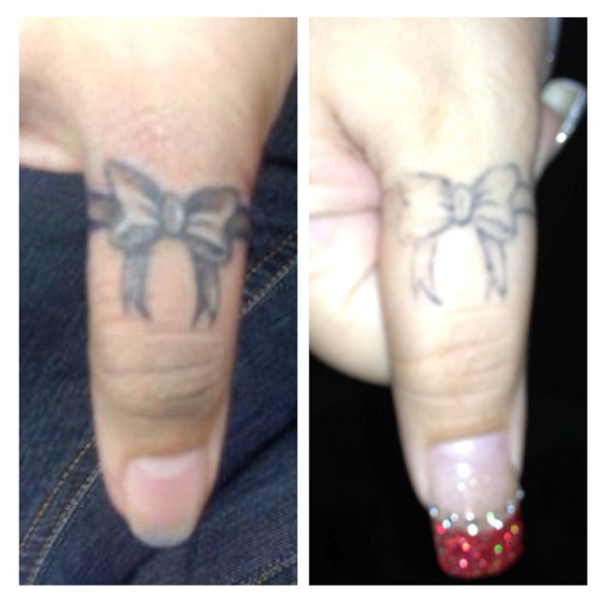 Bow Tattoo On Finger