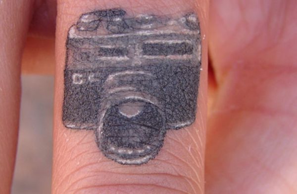 Camera Tattoo On Finger