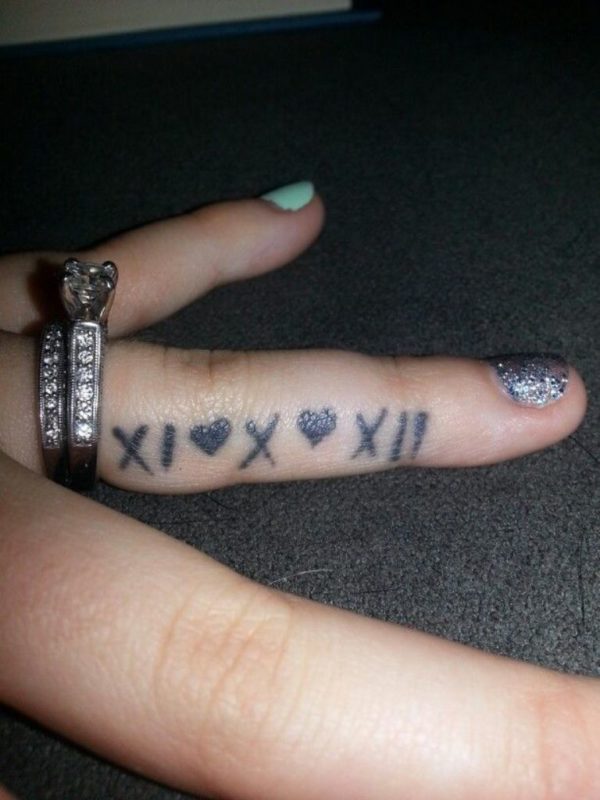 Dates Tattoo Design On Finger