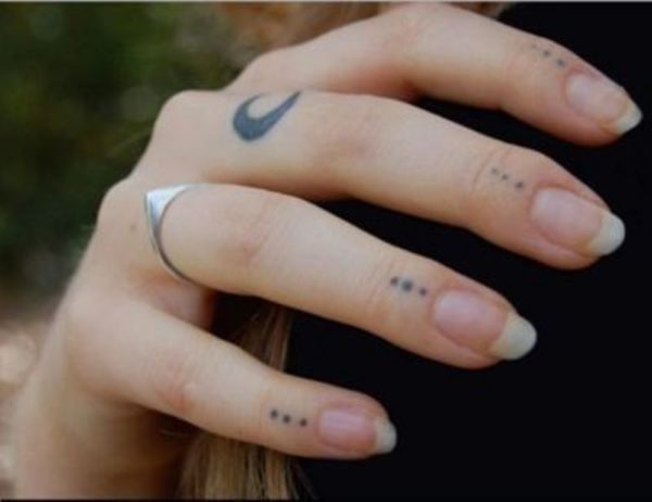 Dots Tattoo On Finger