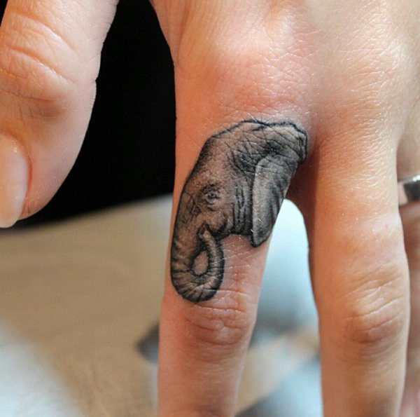 Elephant Neck Tattoo On Finger