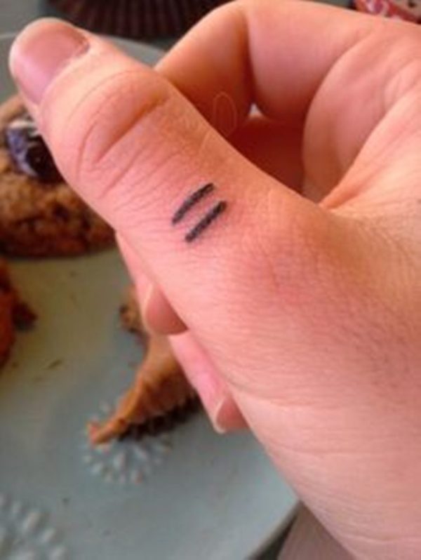 Equality Tattoo On Thumb