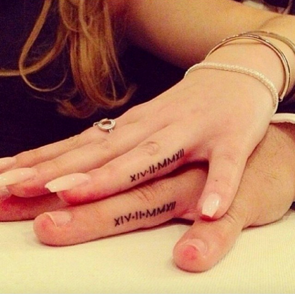 Fantastic Dates Tattoo on Fingers