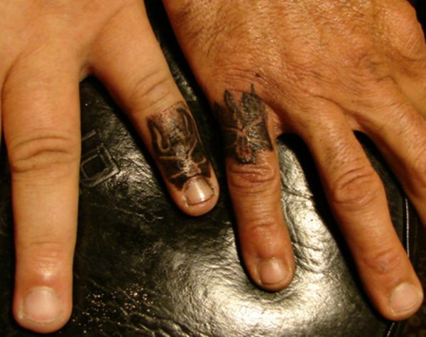 Funky Finger Tattoo