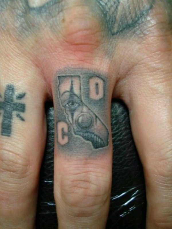 Gangster Tattoo On Finger 