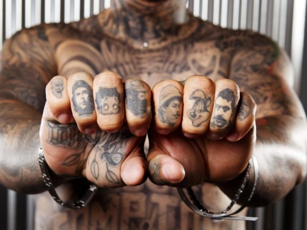 Gangster Tattoo On Finger