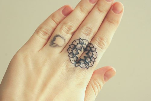 Geometric Tattoo On Finger 