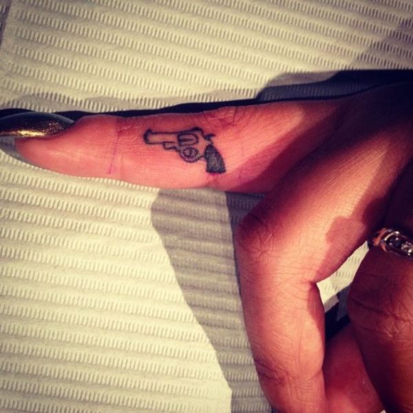 Gun Tattoo On Finger