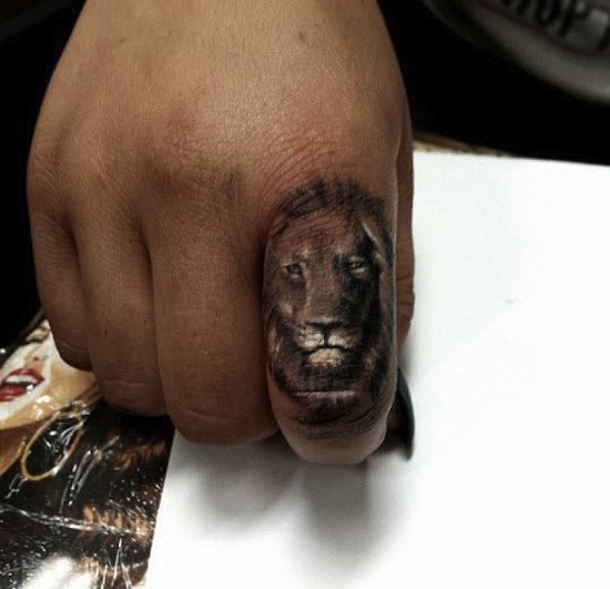 Lion Face Tattoo On Finger