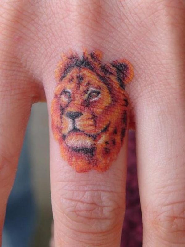 Lion Tattoo On knuckle