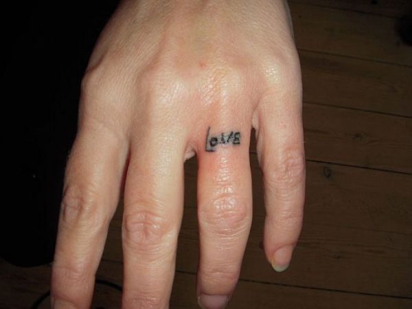 Love Word Tattoo On Finger