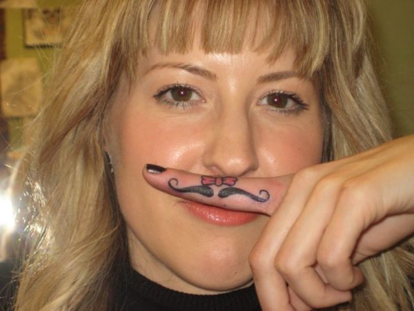 Mustache Finger Tattoo