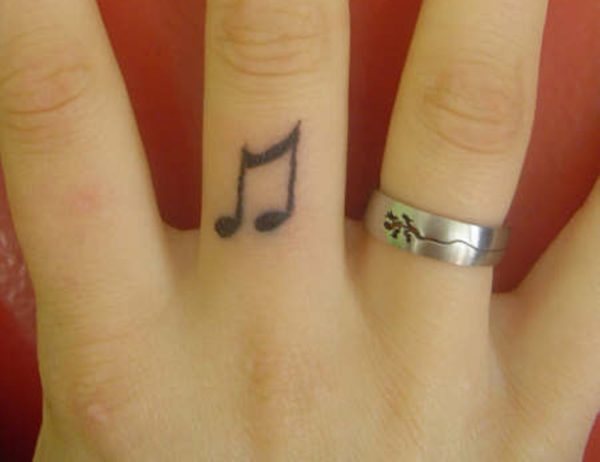 Music Note Finger Tattoo