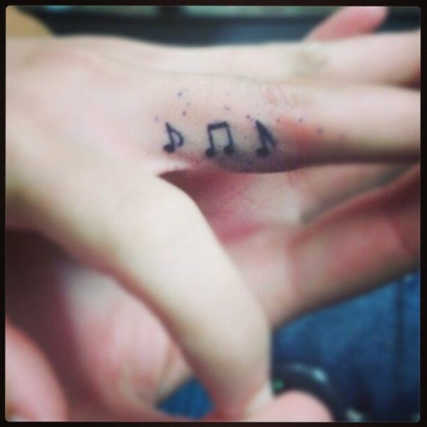 Music Notes Tattoo On Finger