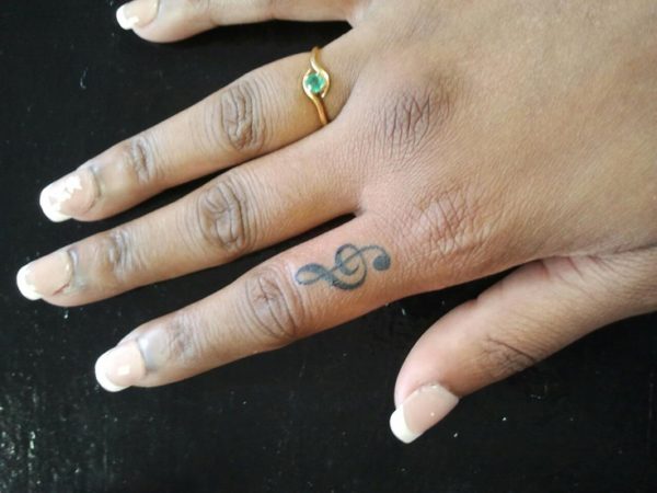 Music Symbol Finger Tattoo