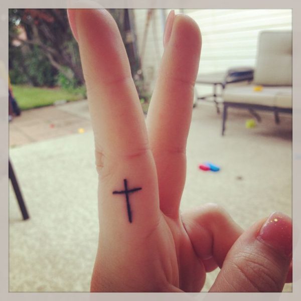 Nice Cross Tattoo On Finger 