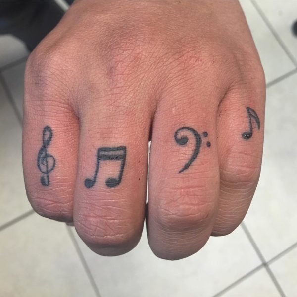 Nice Music Note Tattoos On Fingers