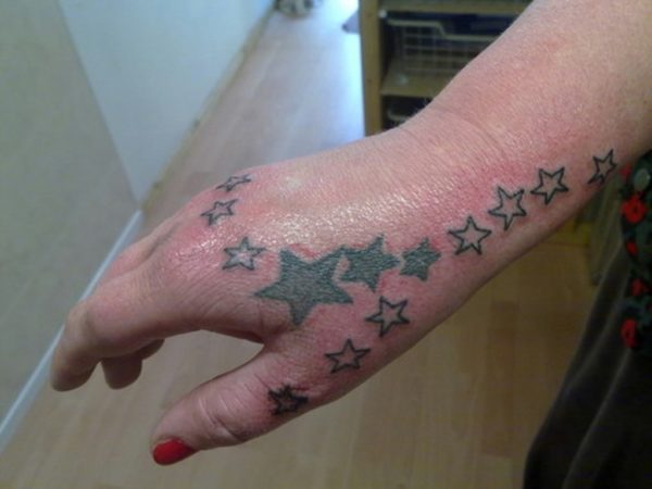 Nice Star Tattoo on Fingers 