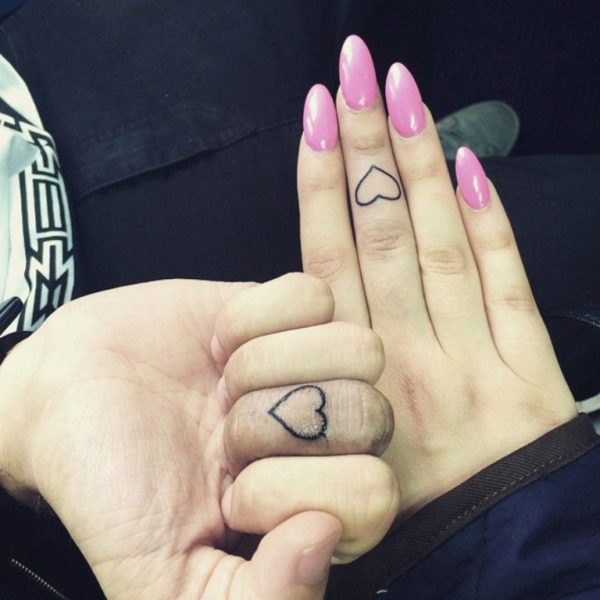 Pink Nail And Heart Tattoo