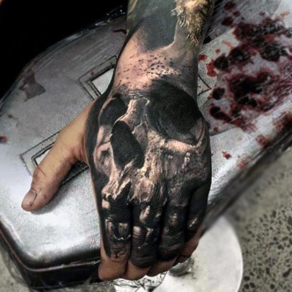 Skull Tattoo On Finger