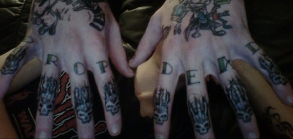 Skull Tattoo On knuckle