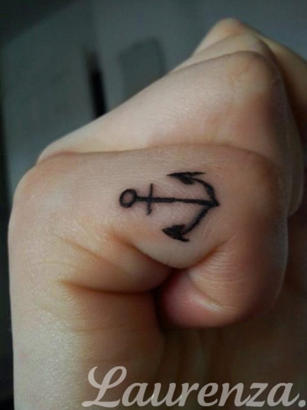 Small Anchor Tattoo On Finger