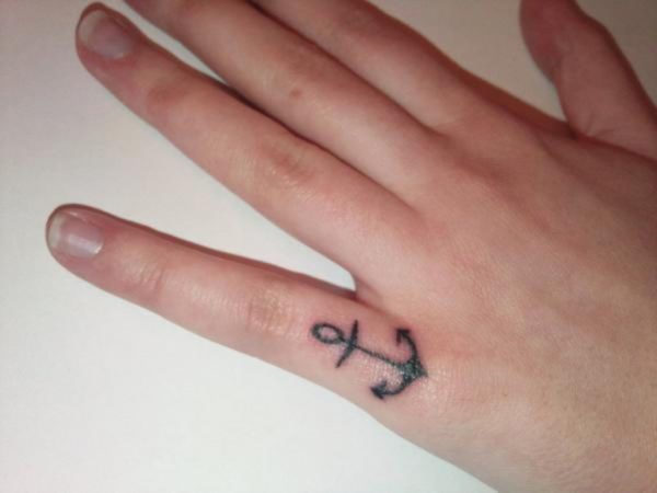 Small Anchor Tattoo On Finger