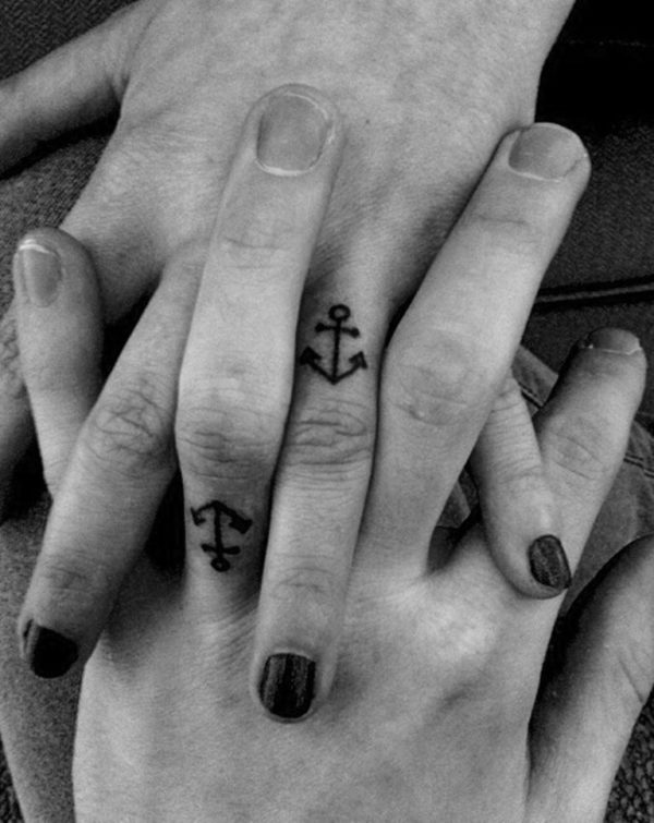 Small Anchor Tattoo On Fingers