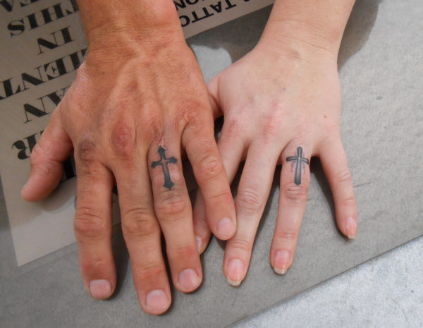 Impressive Cross Tattoo On Finger