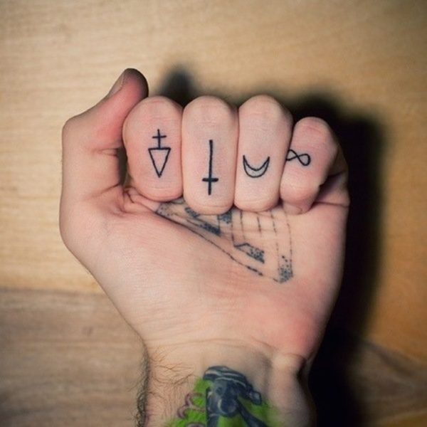 Symbols Tattoo On Fingers