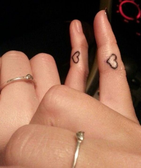 Tiny Heart Tattoo On Fingers
