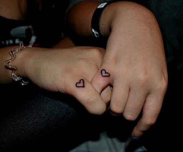 Tiny Hearts Tattoo On Fingers