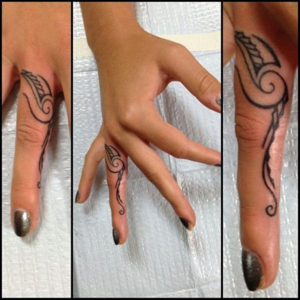 Tribal Ring Finger Tattoo