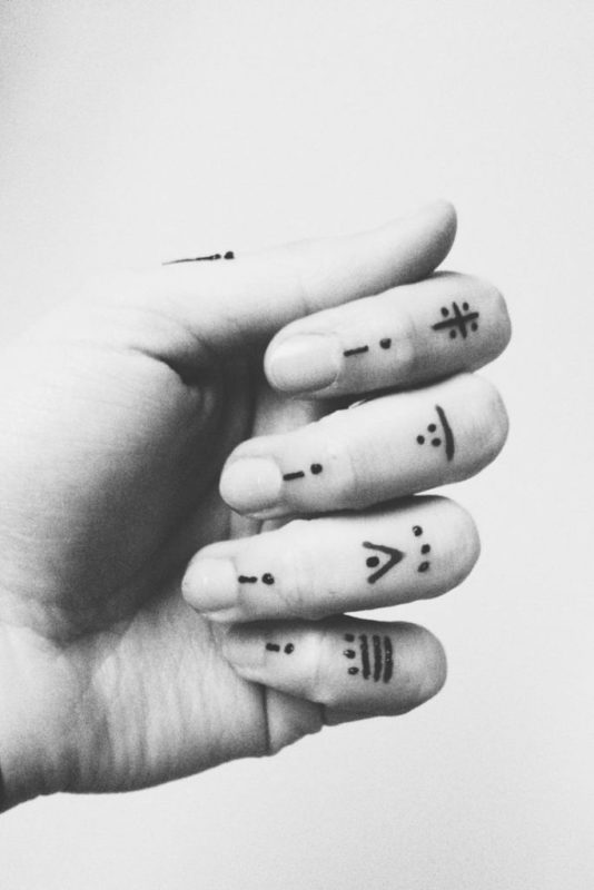 Unique Finger Tattoo