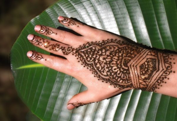 Wonderful Henna Flower Tattoo On Finger
