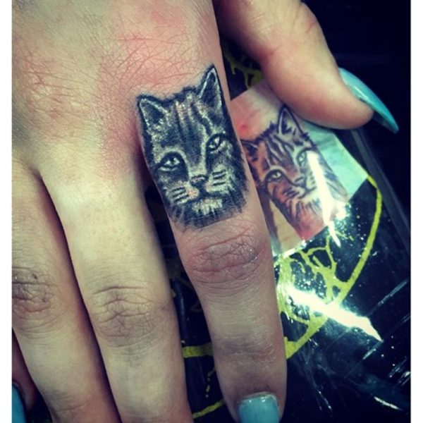 Attractive Cat Tattoo On Finger