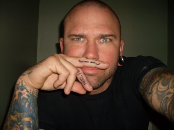 Attractive Finger Mustache Tattoo