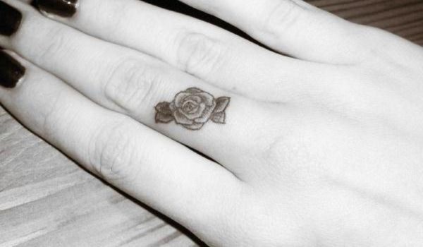 Black And White Rose Finger Tattoo