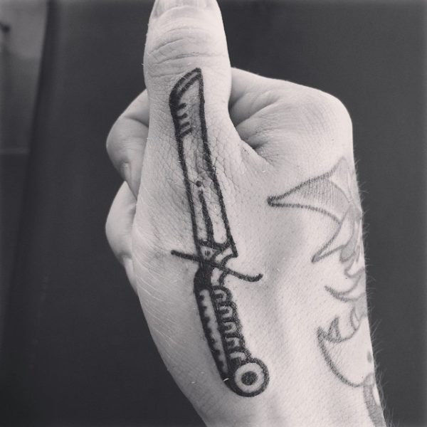 Black And White Sword Tattoo