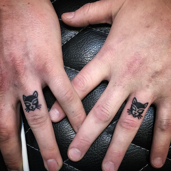 Black Cat Tattoo On Finger