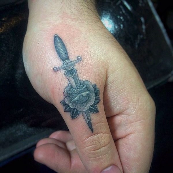 Black Sword Tattoo On Thumb