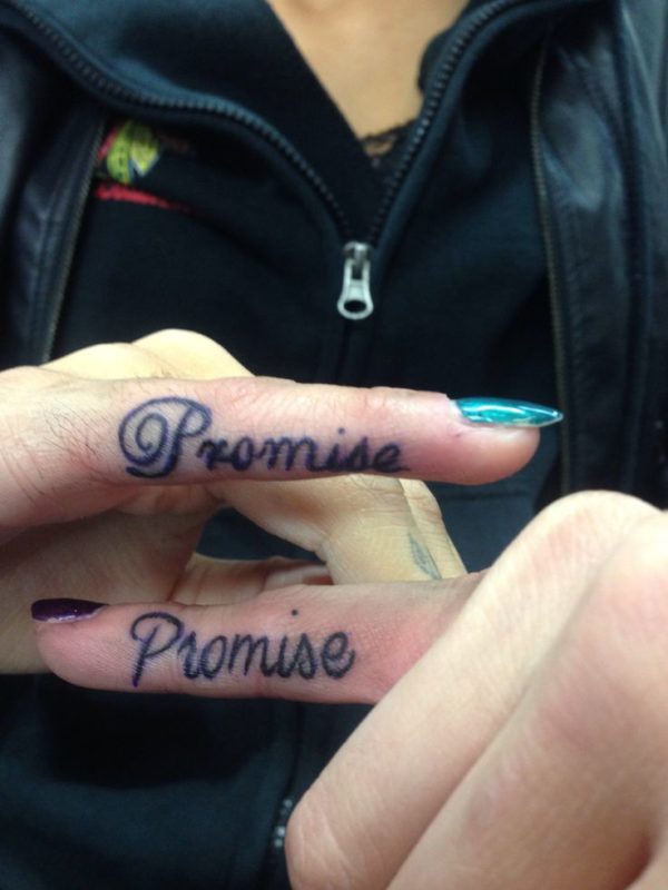 Blue Ink Promise Tattoo On Finger