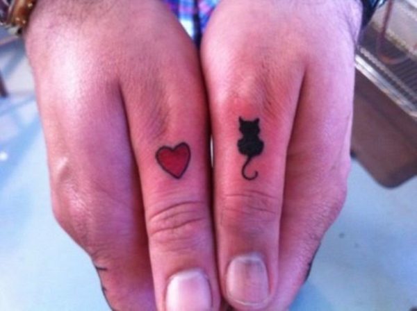 Cat And Heart Tattoo On Thumb